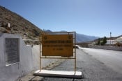 Roadside sign pointing to the Gurdwara