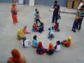 This is the 3-5 years old class playing games outside.